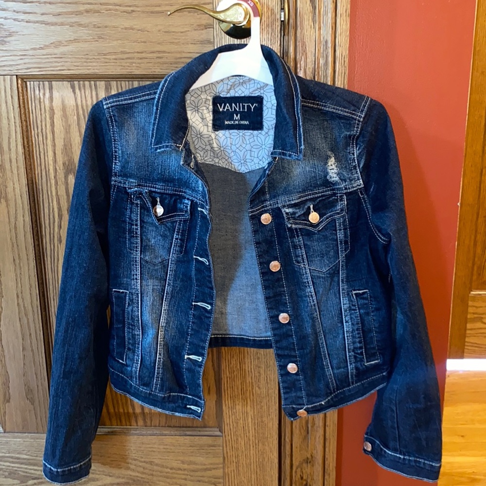 slightly distressed blue denim jean jacket